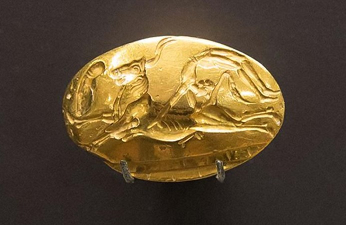 &Chi;&rho;&upsilon;&sigma;ῆ &delta;&alpha;&kappa;&tau;&upsilon;&lambda;&iota;&omicron;&gamma;&lambda;&upsilon;&phi;ί&alpha; &mu;ὲ &tau;ὰ &Tau;&alpha;&upsilon;&rho;&omicron;&kappa;&alpha;&theta;ά&psi;&iota;&alpha;